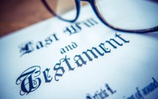 Retro Styled Detail Of A Last Will And Testament Document With Glasses